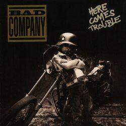 Слушать альбом - Here Comes Trouble